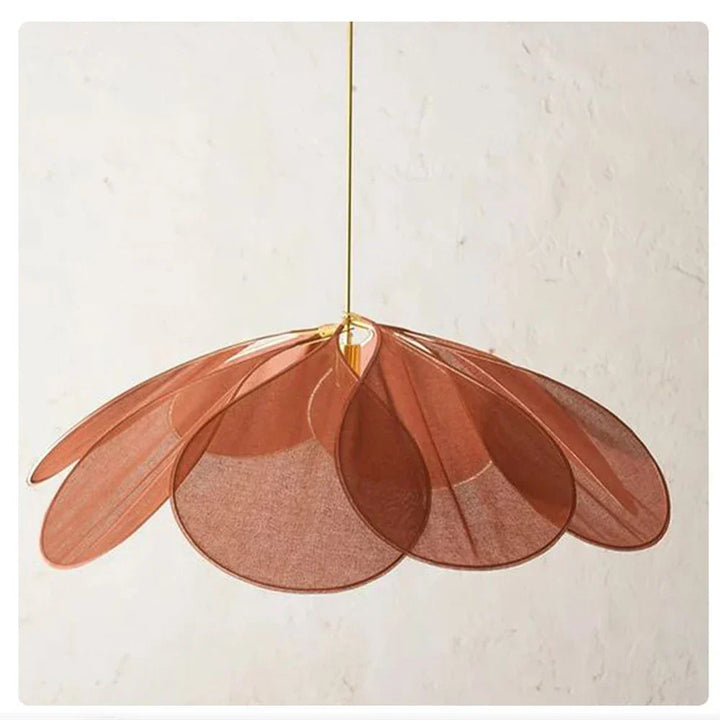 Intricate flower-shaped fabric pendant lamp, creating a warm, natural ambient glow for home decor.