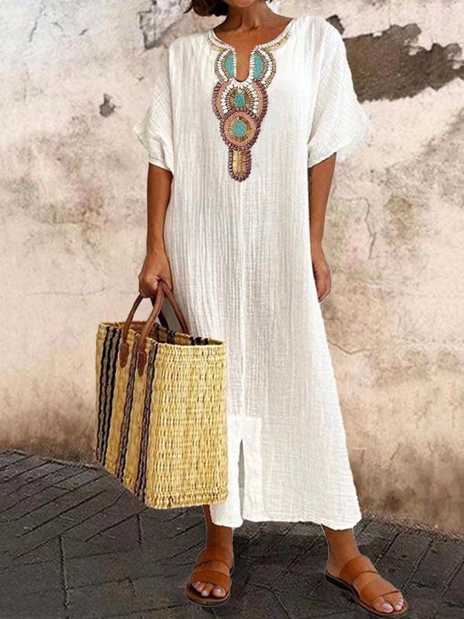 Flowing women's kaftan dress in a summer print, perfect for beach, resort wear, or an elegant vacation outfit.