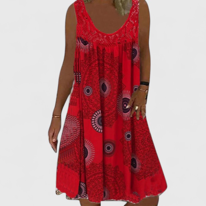 Vibrant ethnic mandala print women's summer dress, a comfortable and flowy boho chic A-line design.