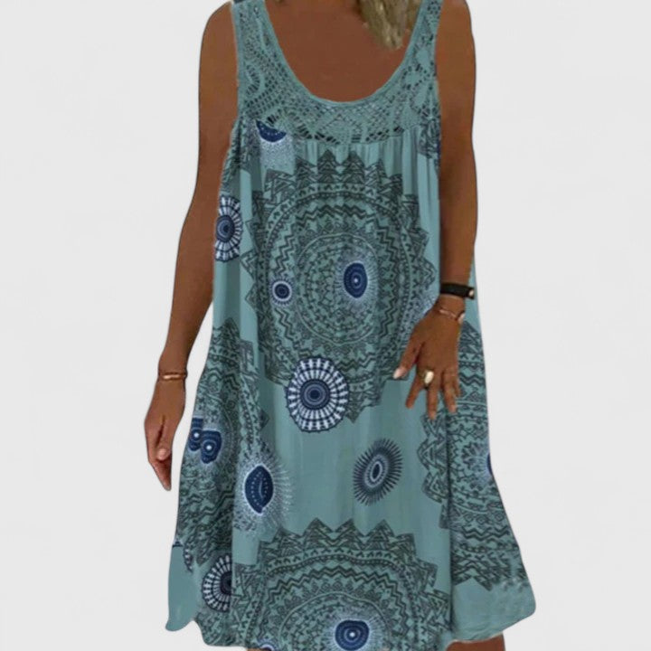 Boho chic women's summer day dress, featuring a comfortable flowy A-line cut and stylish ethnic print.