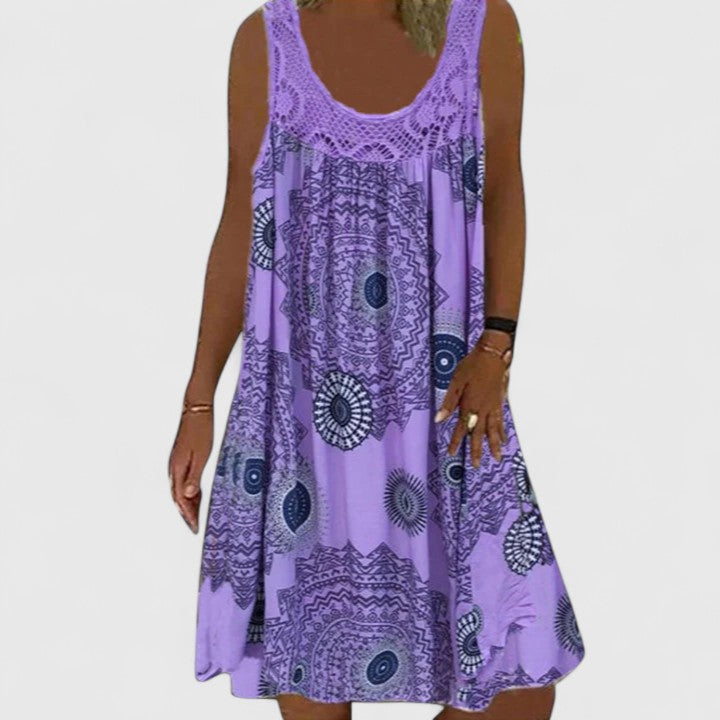Comfortable women's flowy summer dress with an ethnic print, ideal as a boho chic A-line vacation dress.