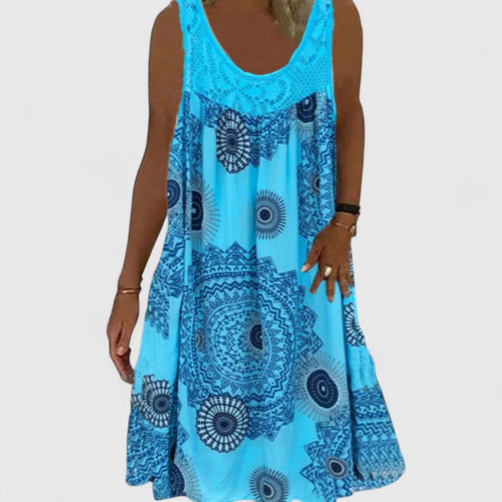 Relaxed fit women's flowy summer dress, a boho chic A-line design with a vibrant ethnic print for vacation.