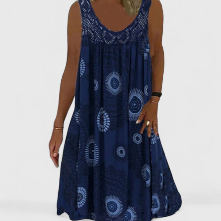 Versatile women's boho chic summer dress, comfortable A-line flowy cut featuring an attractive ethnic print.