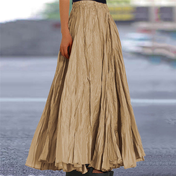Flowy pleated midi skirt for women, elastic waist for comfort & style.