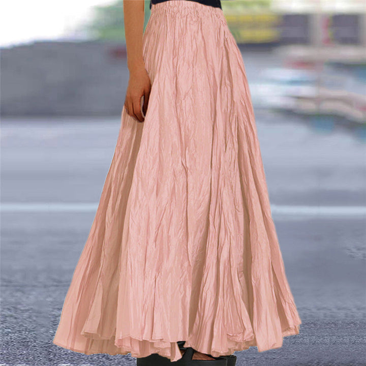 Comfortable women's midi pleated skirt, A-line cut with elastic waistband.