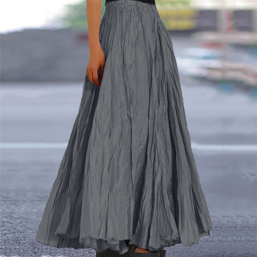 Dressy women's A-line pleated skirt, elegant & comfortable elastic waist.