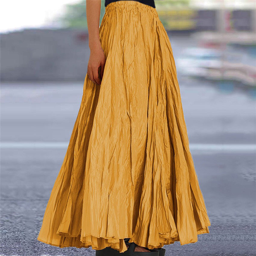 Chic women's long pleated skirt, comfortable elastic waistband for daily wear.