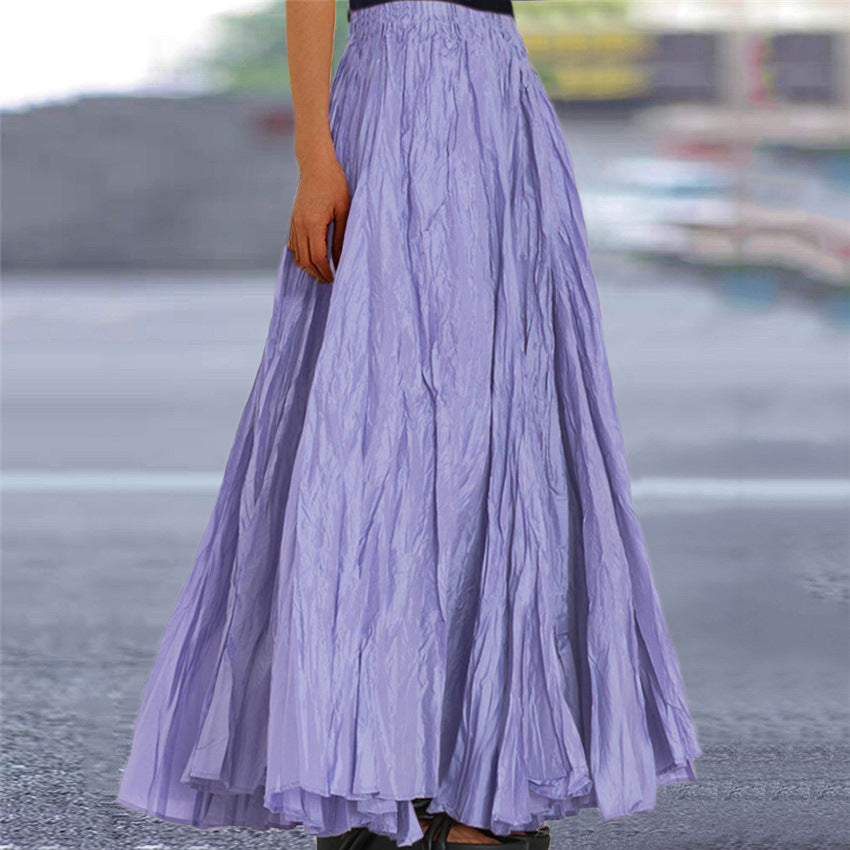 Casual women's A-line pleated skirt, flowy comfort with an elastic waist.