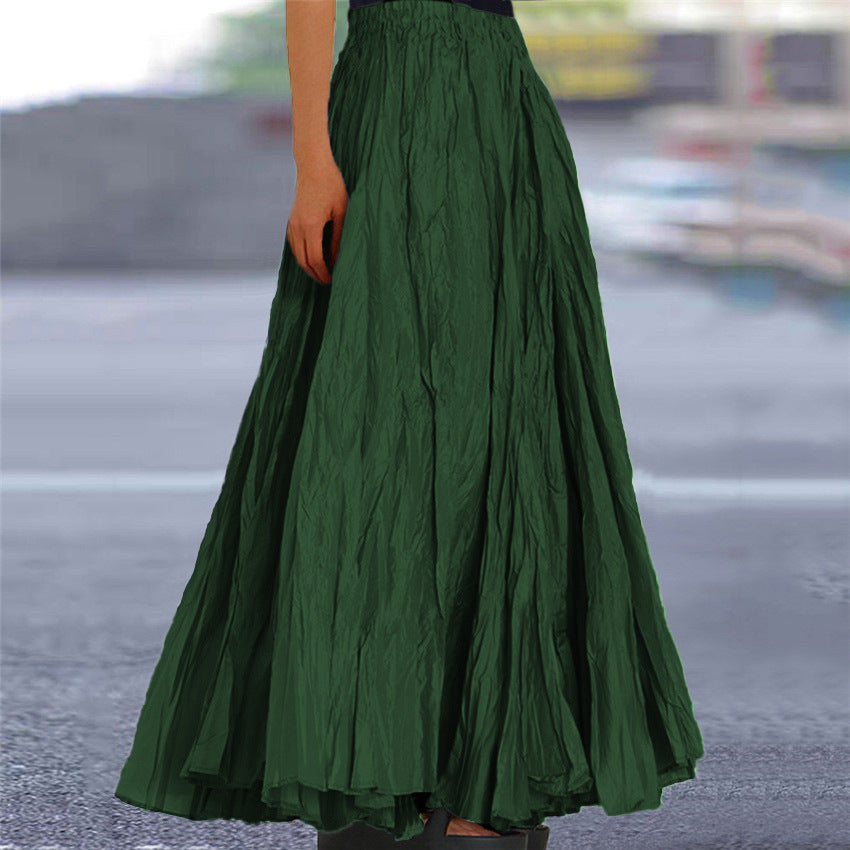 Versatile women's pleated long skirt, elastic waist for stylish comfort.