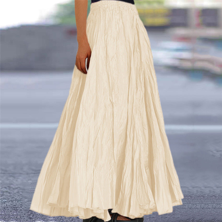 Comfortable women's pleated midi skirt, flowy style, easy elastic waist.