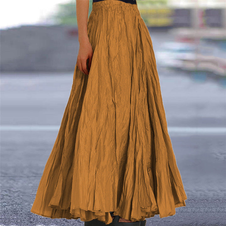 Casual women's pleated midi skirt, elastic waistband for effortless style.