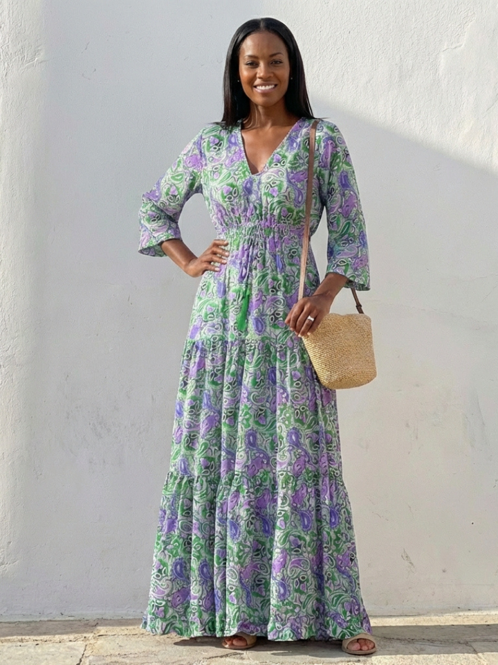 Comfortable women's bohemian long sleeve maxi dress with a flowy silhouette, V-neck, and beautiful paisley design.