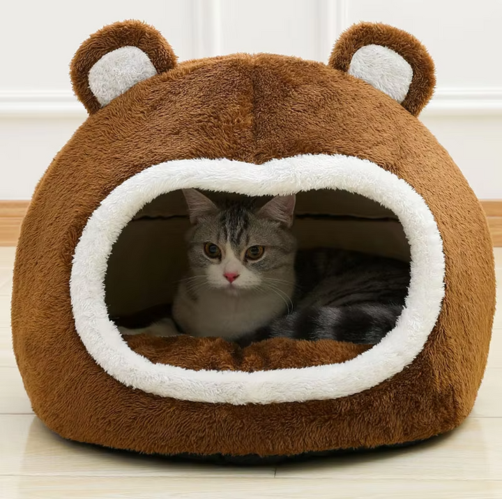 Fluffy bear cat cave bed, a cozy pet hideaway with a non-slip base for secure comfort.