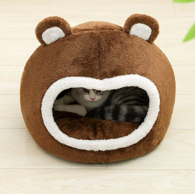 Washable fluffy bear cat bed, a durable pet cave with a non-slip base, ideal for anxious cats.