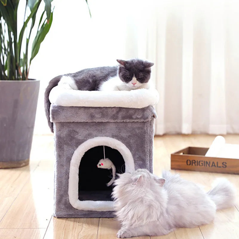 Cozy, foldable cat bed with plush lying surface. Perfect cat retreat & pet furniture, includes a fun toy.