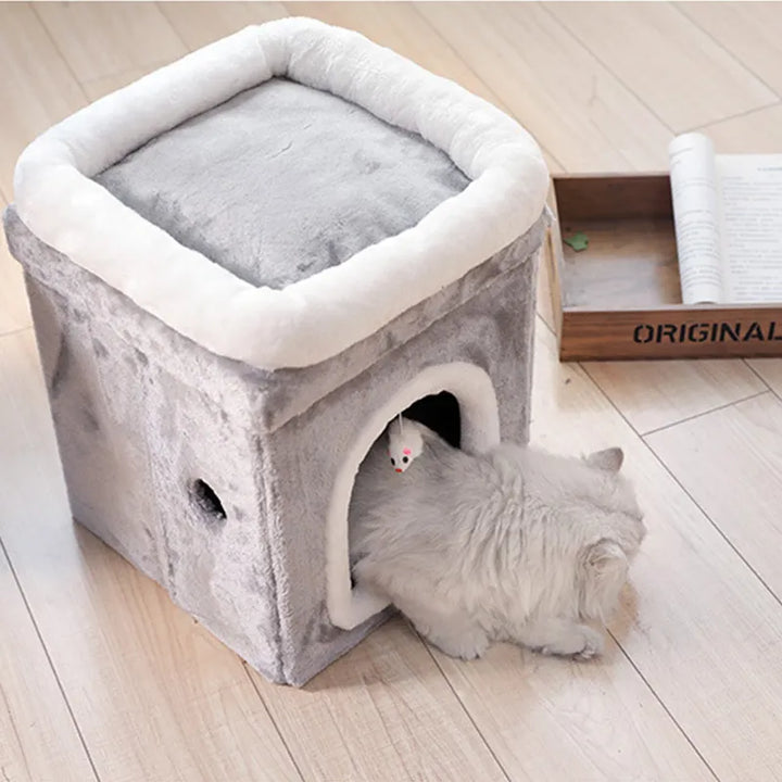 Stylish foldable cat cave bed for a private retreat. Features a comfortable lying surface & integrated cat toy.