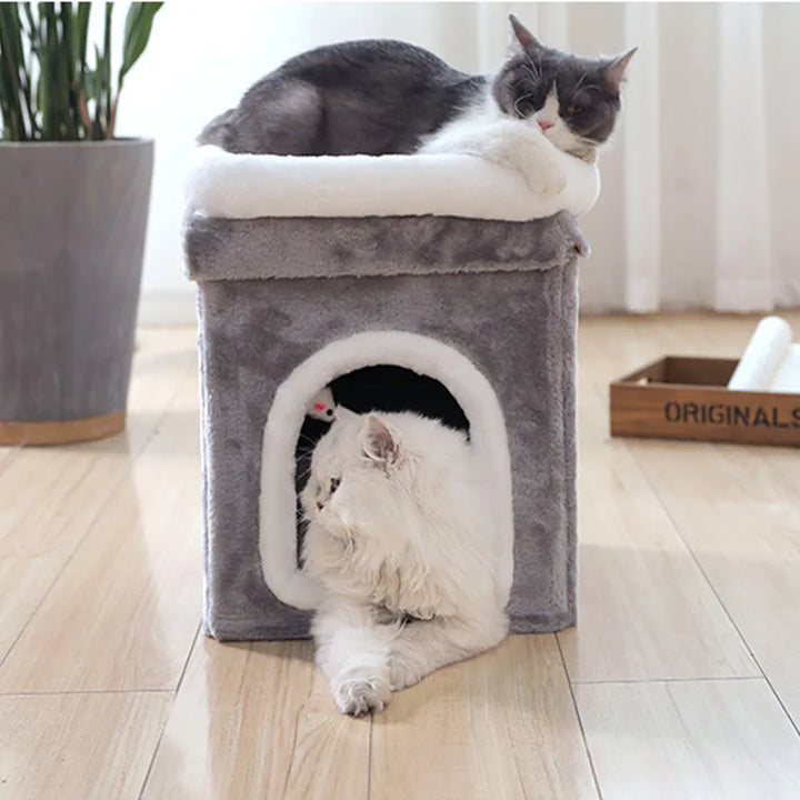 Space-saving foldable cat bed, a cozy pet cave with a comfy surface & a hanging cat toy for small cats.