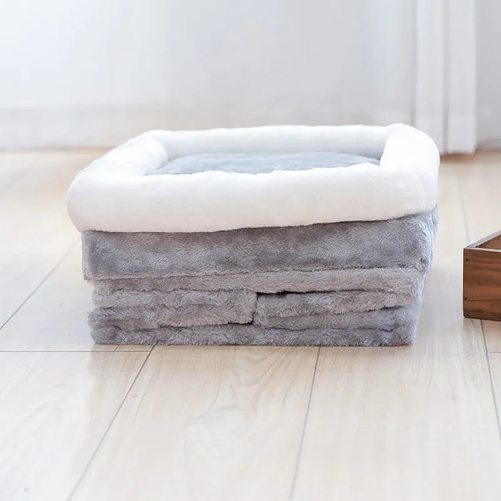 Grey foldable cat cave bed, offering ultimate cat comfort with a soft top mat & built-in toy for endless playtime.