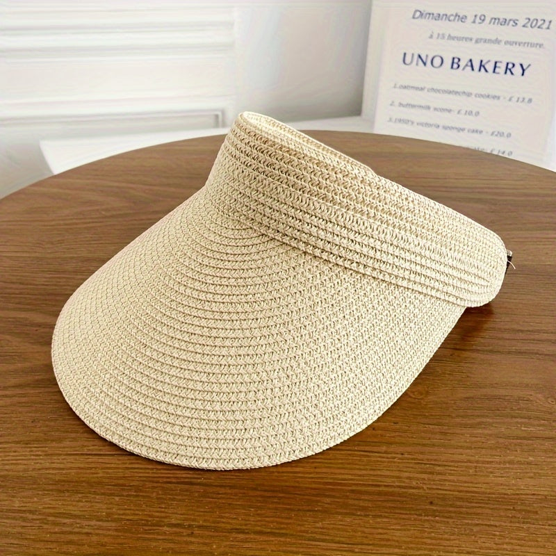 Stylish wide brim sun visor, foldable and ideal for travel and beach.