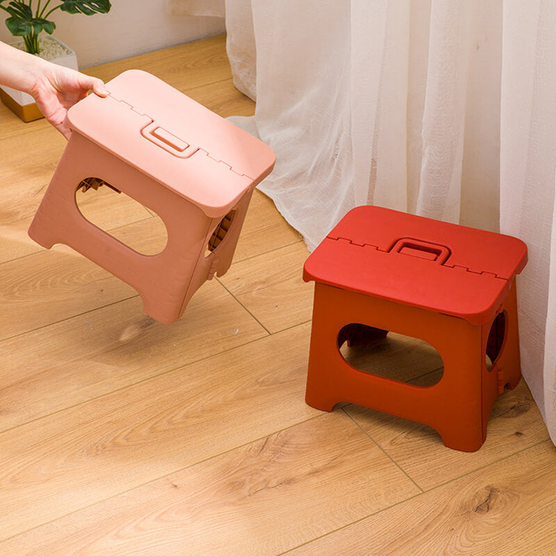 Space-saving folding step stool with easy-reach handle for compact storage. Great for small kitchens & bathrooms.