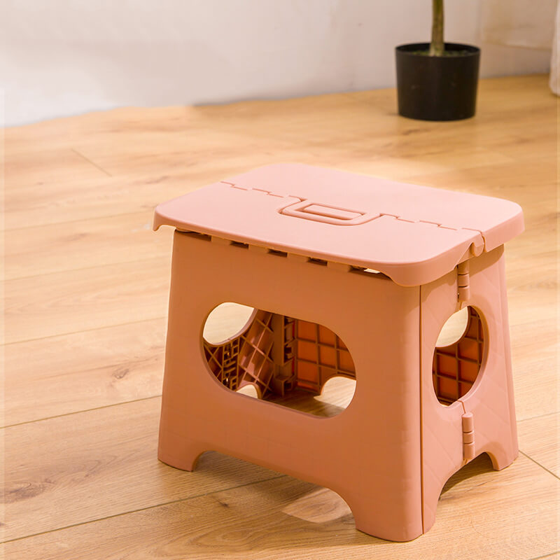 Multi-use folding step stool with handle for kids & adults. Perfect for kitchen access, bathroom tasks, and more.