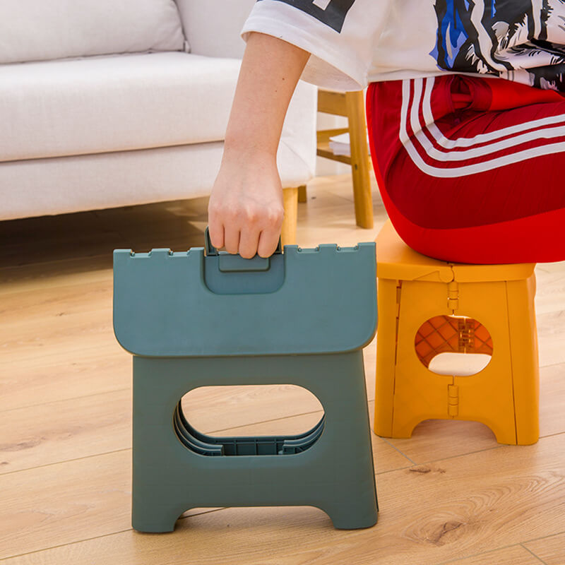 Convenient household utility folding step stool with handle for kids & adults. Provides an easy height boost.