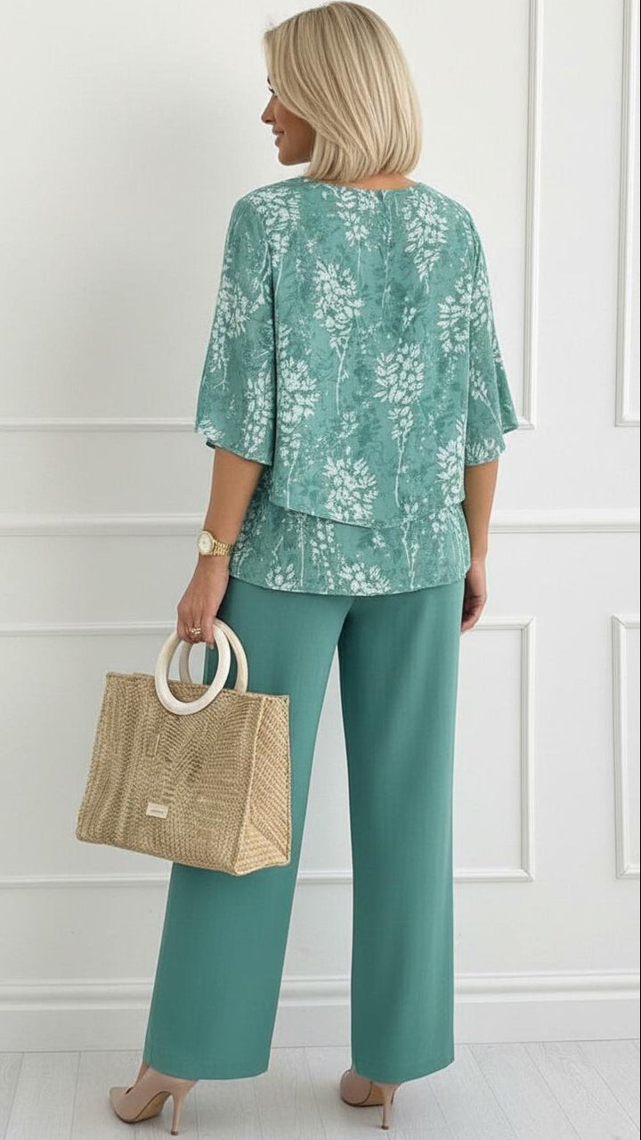 Women's casual teal floral co-ord set with a stylish flowy top and comfortable wide-leg pants. Summer fashion.
