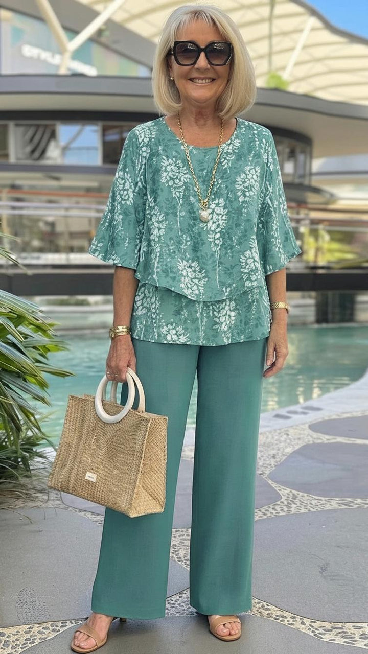 Flowy top of a women's fresh teal floral two-piece set, ideal for comfortable summer outfits and casual wear.