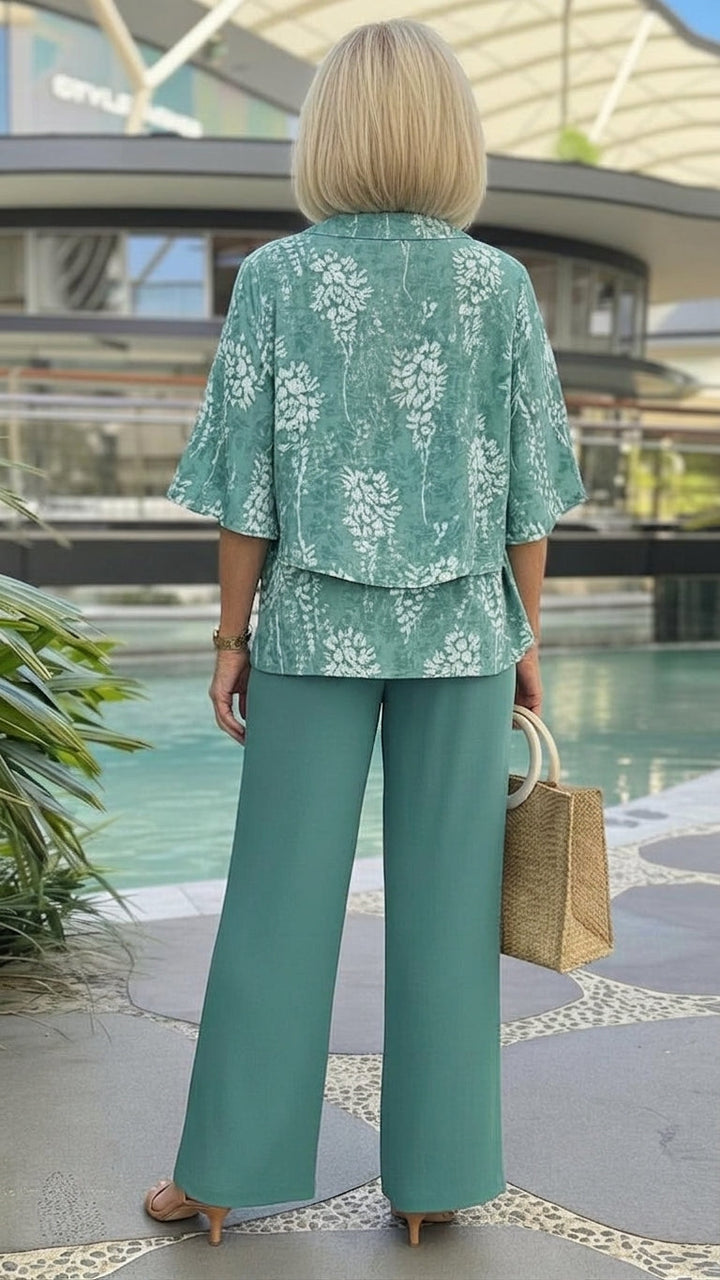 Stylish women's summer two-piece outfit in fresh teal floral, a comfortable & casual wide-leg pant and top set.