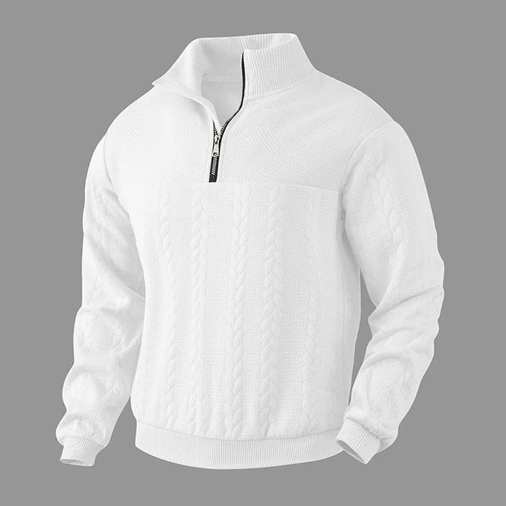 Folded Men's Cable-Knit Quarter-Zip Pullover Sweater on wooden surface, ready to wear, classic fashion.