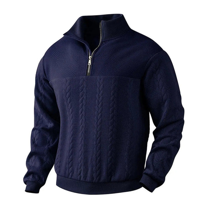 Detailed texture of cable knit on a men's smart casual quarter-zip sweater, emphasizing craftsmanship.