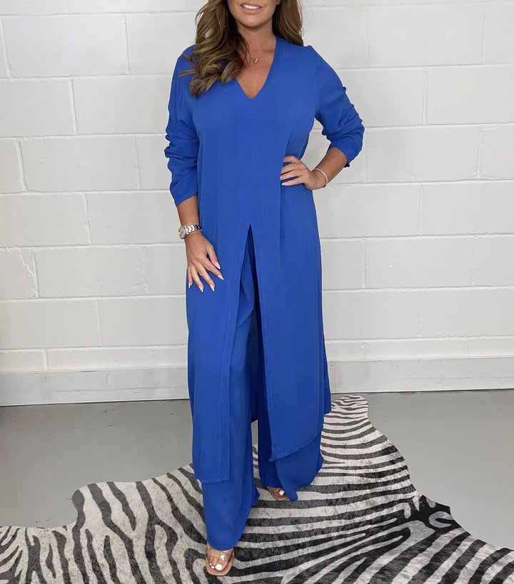 Relaxed long sleeve V-neck top with side slit and matching pants for women's autumn spring casual fashion.