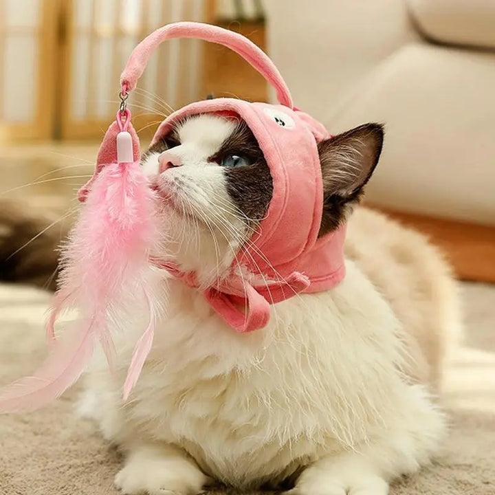 Funny cat costume hat with an interactive feather toy pendant for playful felines.