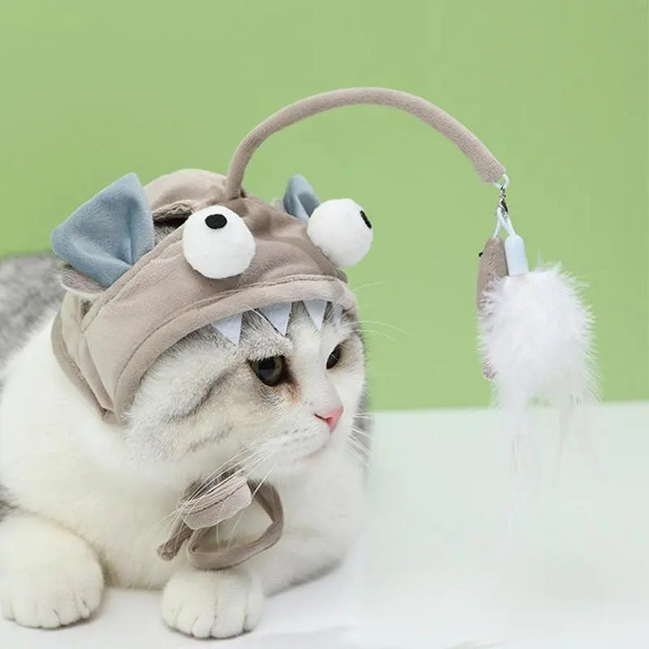 Cute pet hat for cats, featuring a dangling toy for engaging interactive play sessions.