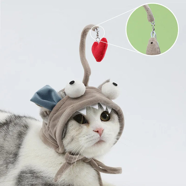 Playful cat hat with a built-in toy pendant, perfect for funny pet photo opportunities.