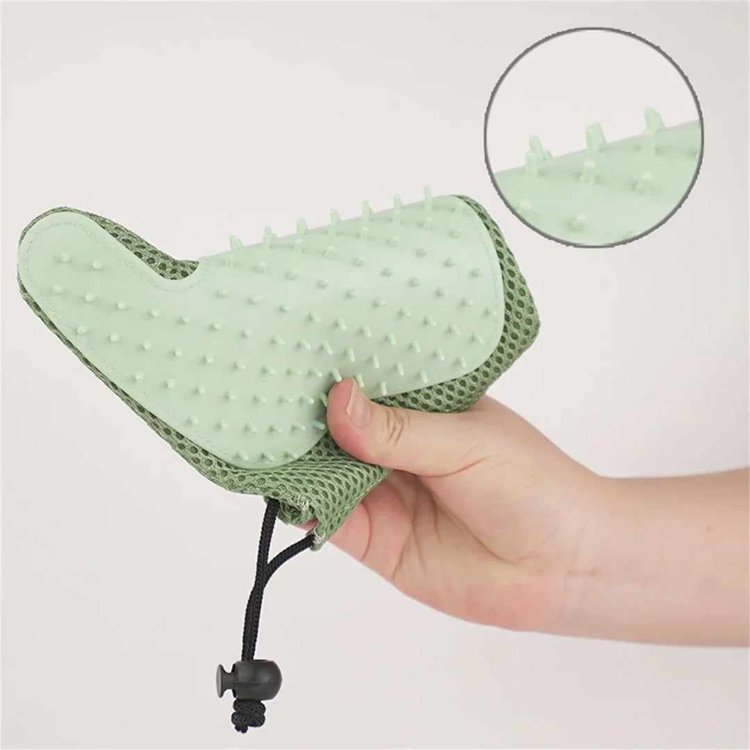 Essential cat care accessory: a multi-functional de-shedding and massage glove.
