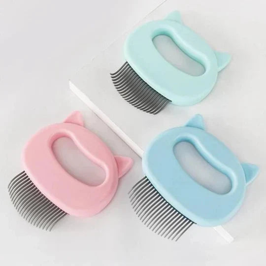 Comforting cat massage brush & shedding tool for effective hair removal and promoting a smooth, healthy feline coat.