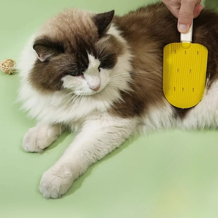 Gentle deshedding brush for dogs and cats, reducing shedding and removing pet hair.