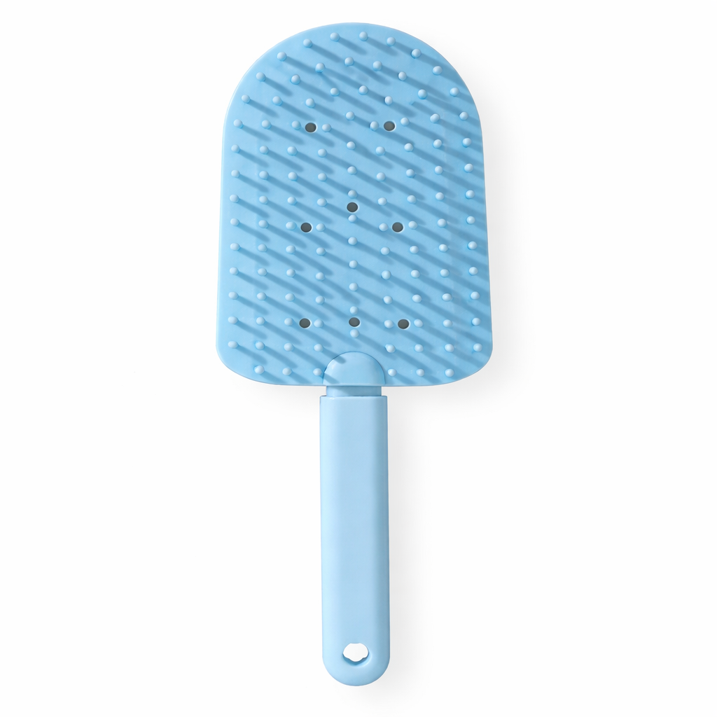 Ergonomic deshedding brush designed for comfortable pet grooming and hair removal.