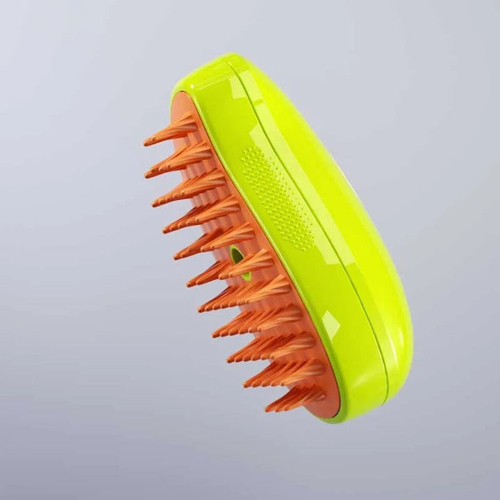 Close-up of pet steam brush head showing soft bristles for safe grooming