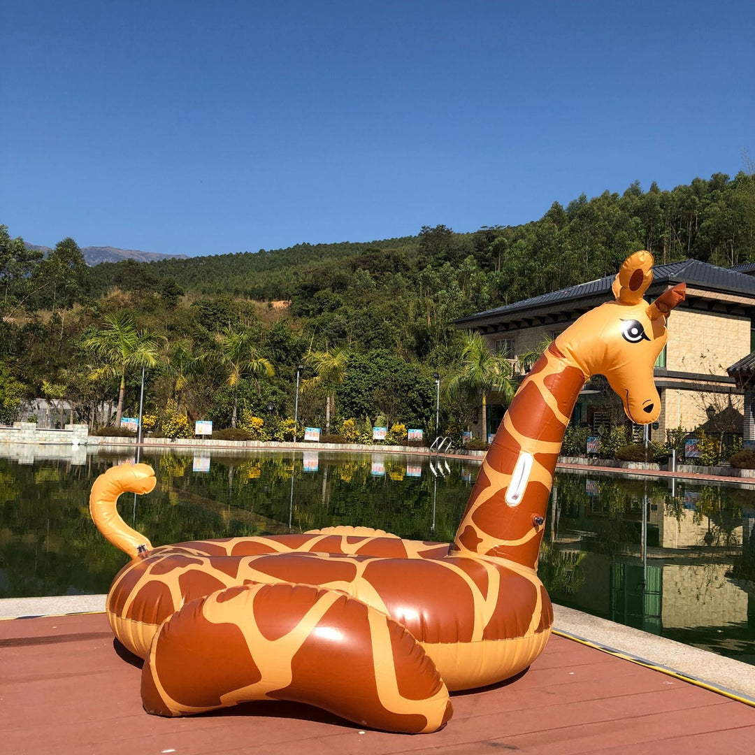 Unisex giant giraffe water toy, a huge inflatable pool float perfect for beach days & summer fun.