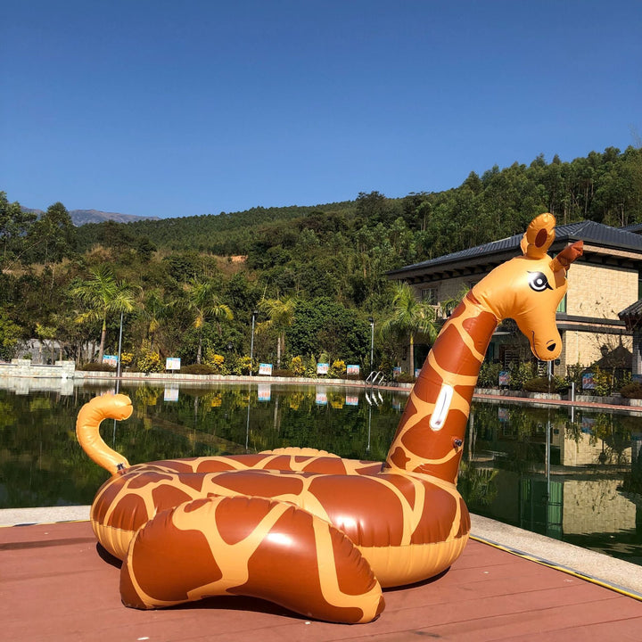 Unisex giant giraffe water toy, a huge inflatable pool float perfect for beach days & summer fun.