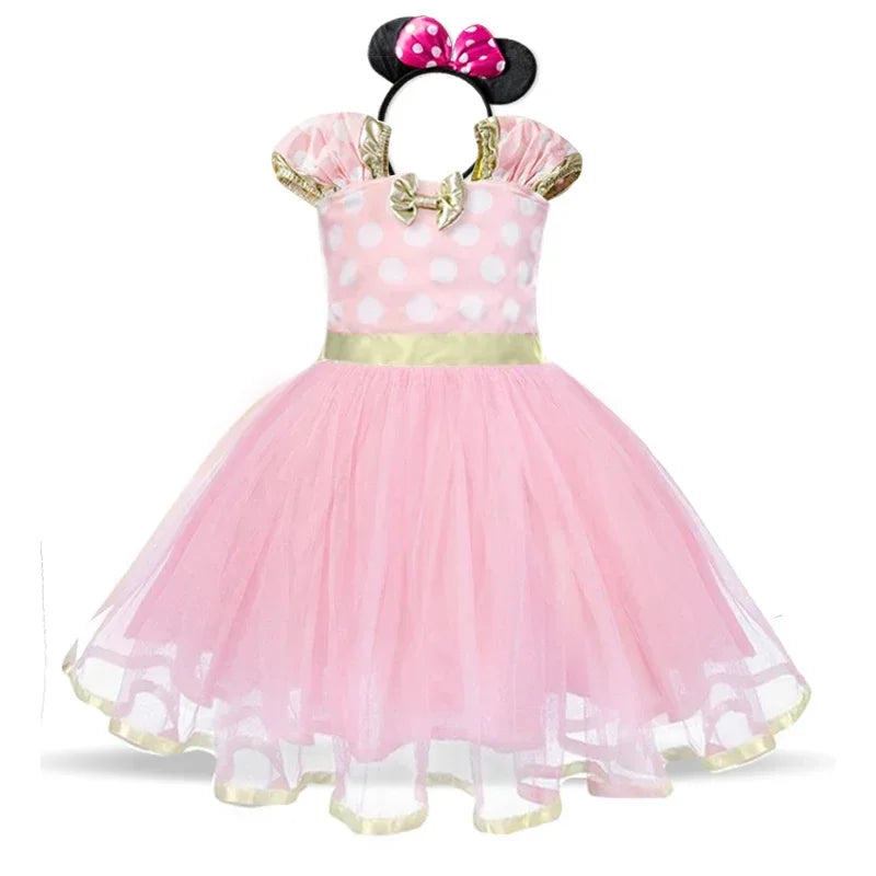 Girls' Minnie Mouse themed costume: red polkadot dress with puffy sleeves and a delightful bow headband.