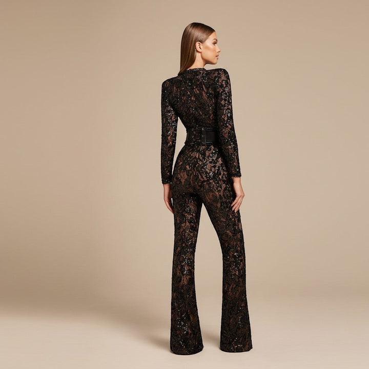 Elegant formal jumpsuit for women, featuring long sleeves, wide leg, and defined waist. Ideal for parties.