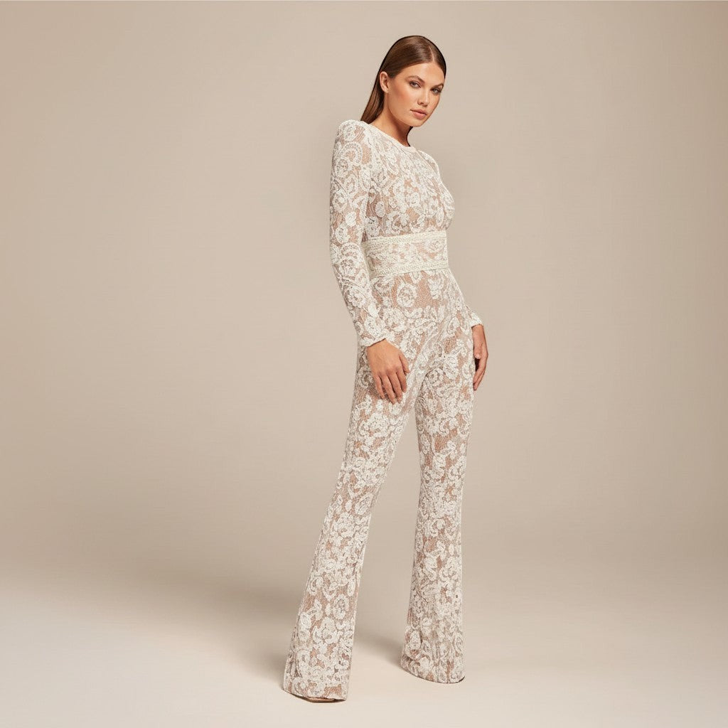 Formal long sleeve wide leg jumpsuit for women. Elegant evening wear with a flattering defined waist.