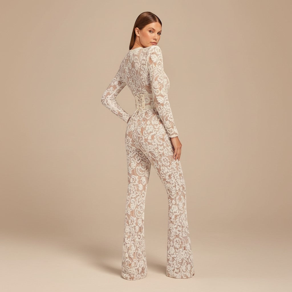 Glamorous women's jumpsuit, perfect for special occasions. Features long sleeves, wide leg, defined waist.