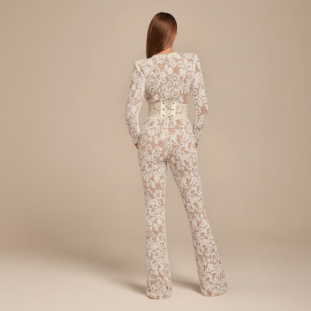 Elegant wide leg jumpsuit for women. Long sleeve, formal evening wear with a chic structured waist.