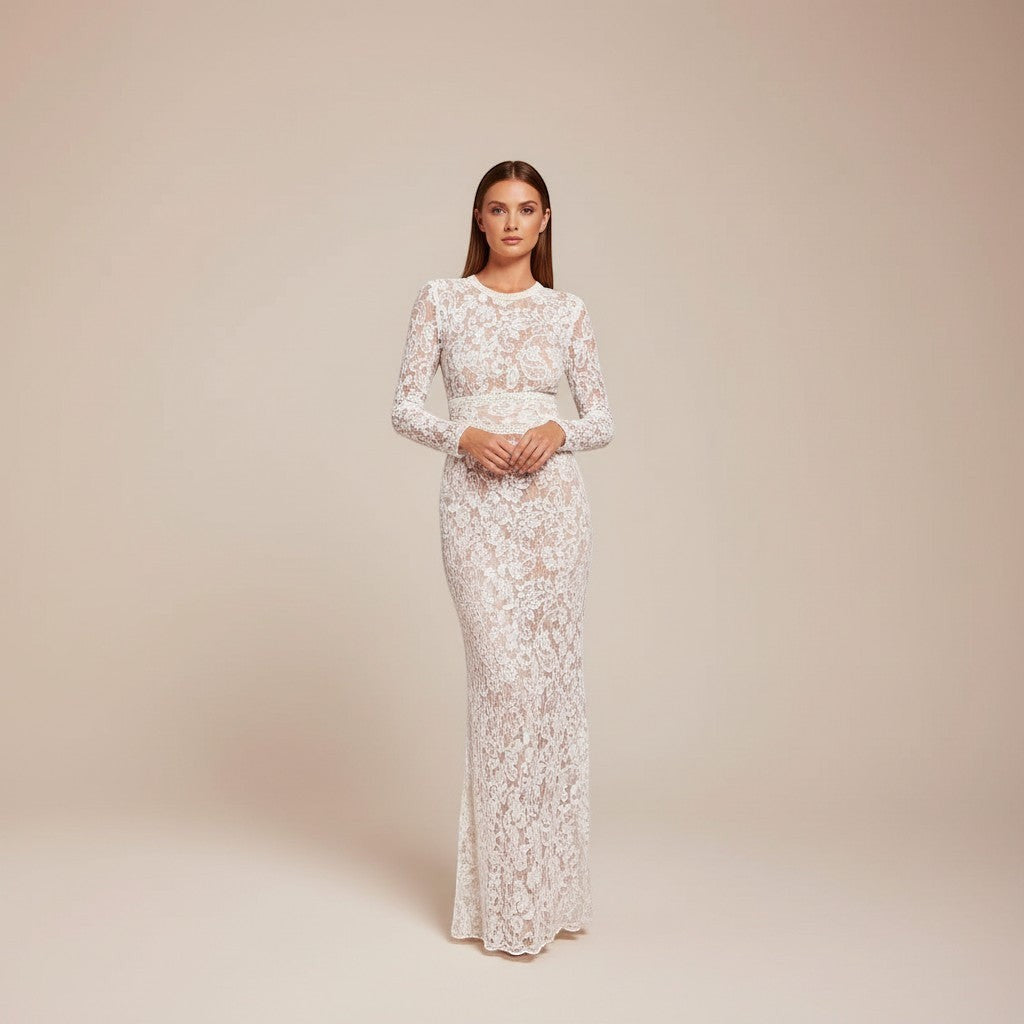 Stylish women's party outfit: long sleeve wide leg jumpsuit with a glamorous, defined waist.