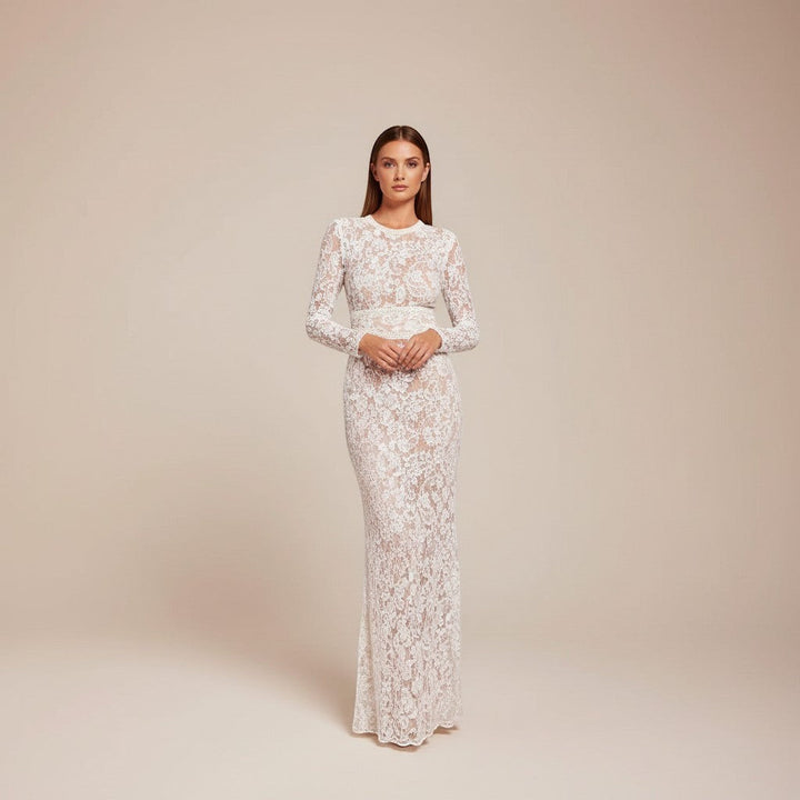 Stylish women's party outfit: long sleeve wide leg jumpsuit with a glamorous, defined waist.