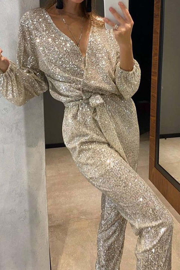Glamorous women's sequin bandage jumpsuit with a stylish V-neck, perfect for evening parties & special occasions.
